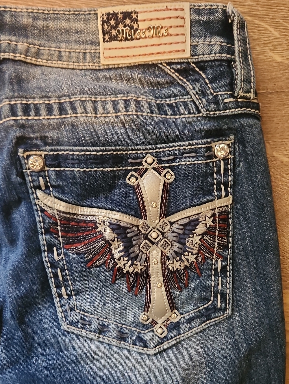 Miss Me Denim Bootcut Jeans with Embroidered Cross & Wing Back Pocket